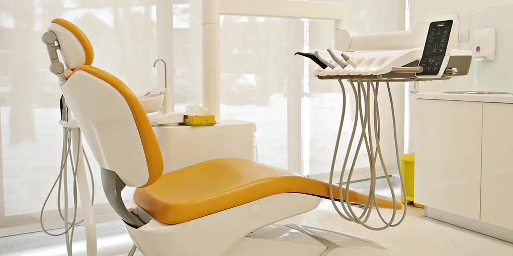 A modern dental chair in the bright treatment room at Ordinacija Ružić